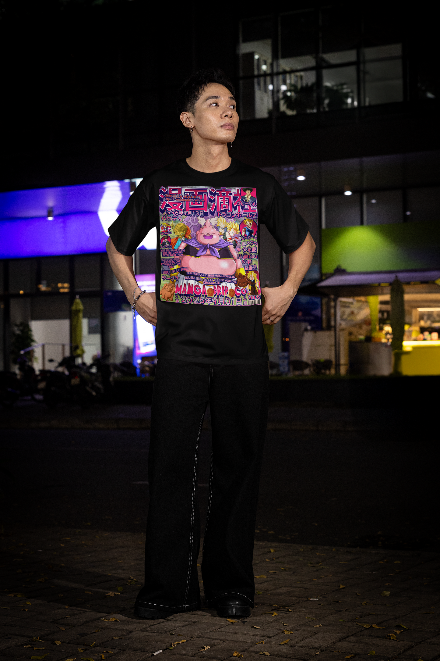 "Stylish man wearing all black Majin Buu Evil Arc t-shirt showcasing premium DBZ villain streetwear and dark anime fashion aesthetic"
