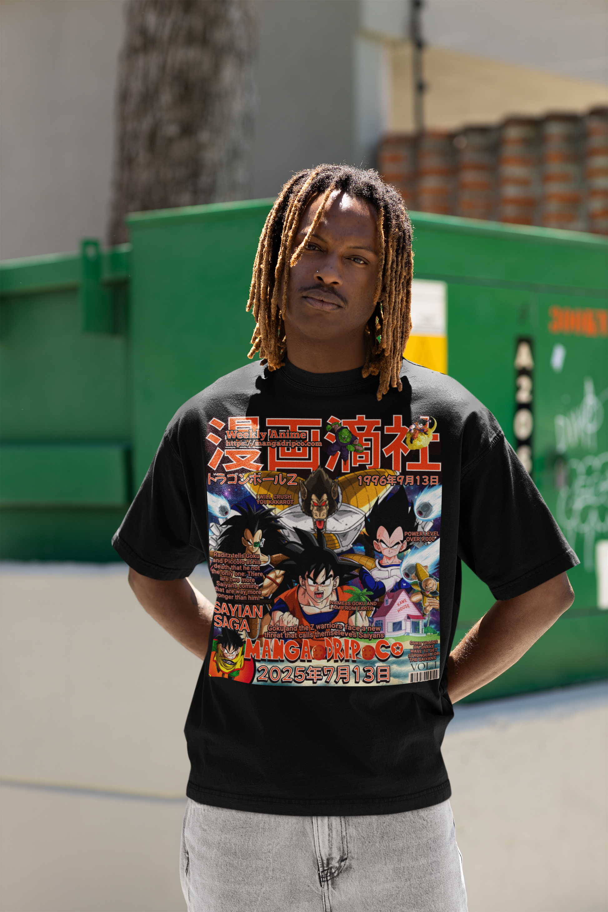 Close-up of Black male model wearing Goku vs Vegeta Saiyan Saga graphic tee – detailed Dragon Ball Z anime artwork on black shirt.