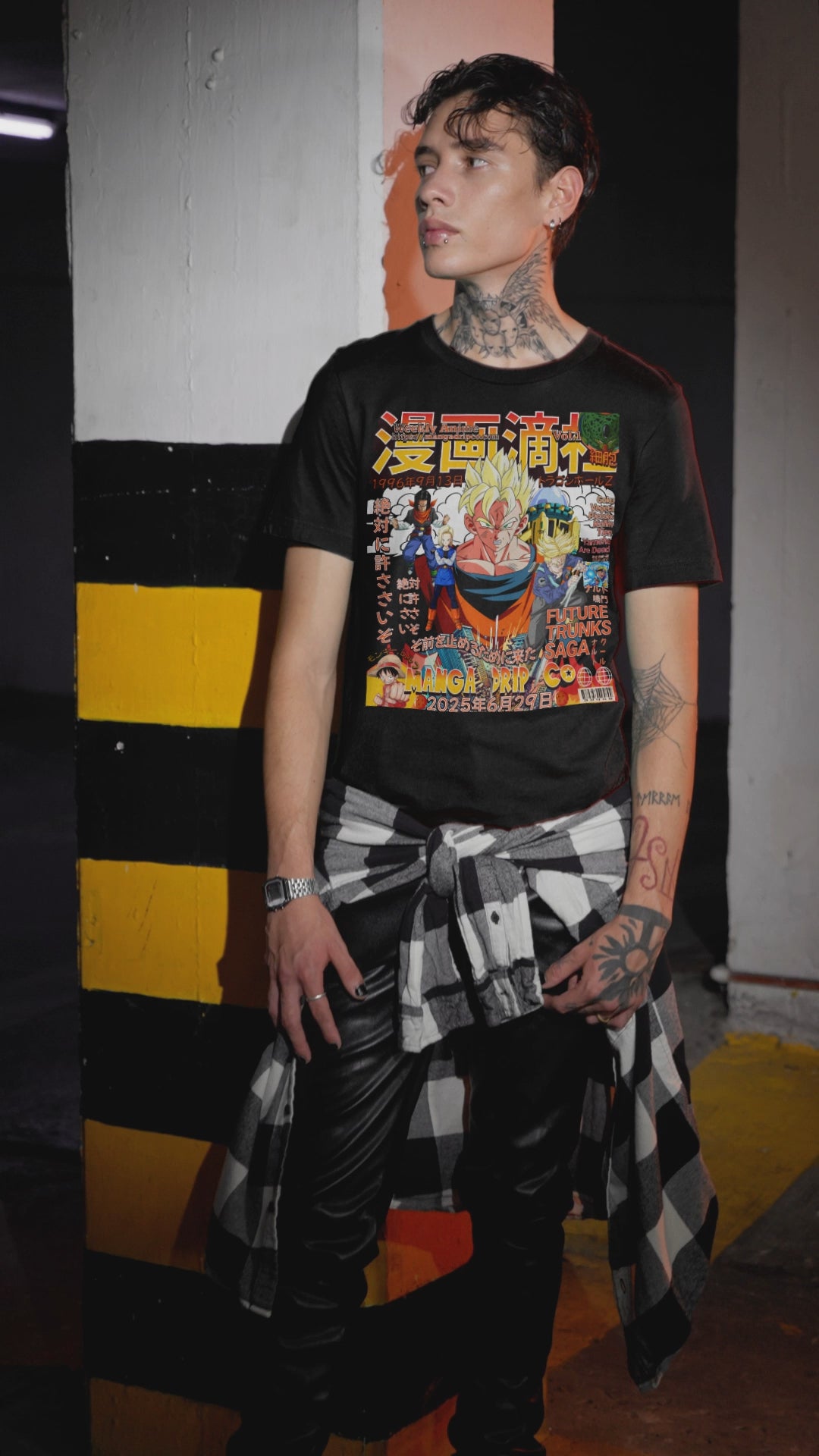 “Tattooed man in oversized Bella+Canvas t-shirt posing in parking lot – gothic streetwear aesthetic”